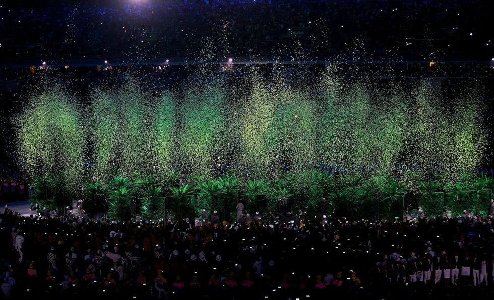 Opening ceremony: The crowd is covered in glittering confetti.
