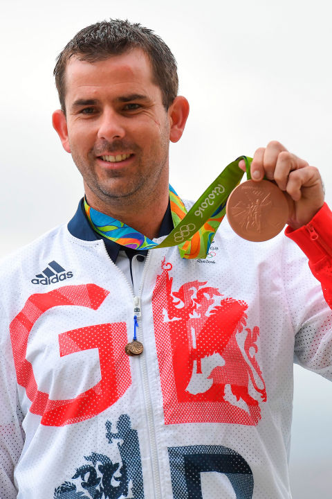 Day three: Ed Ling with his medal.
