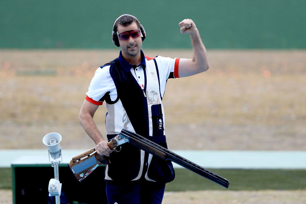 Day three: Ed Ling celebrates winning a bronze medal in the Men's Trap Event at the Olympic Shooting Centre. 
