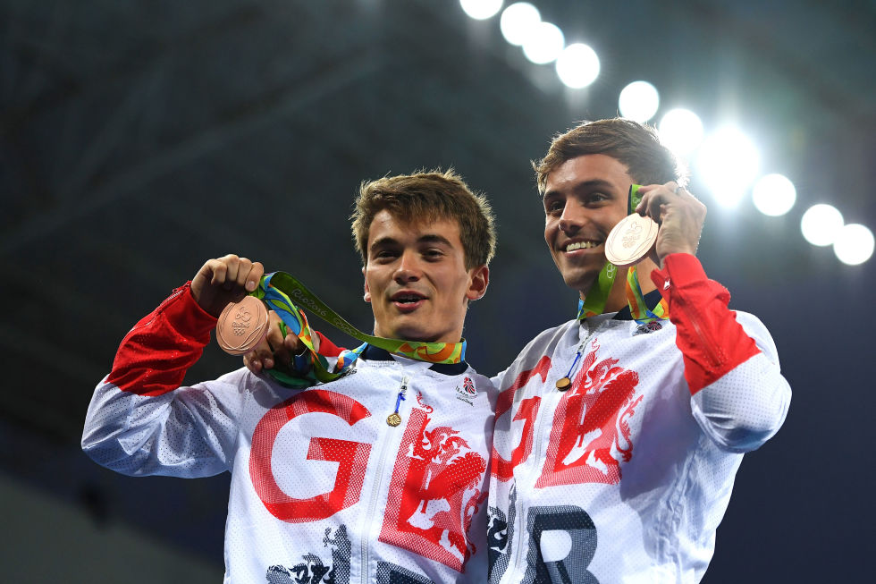 Day three: Daley and Goodfellow pose with their medals on the podium.
